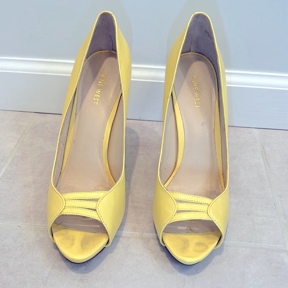 Beautiful platform soft yellow heels.